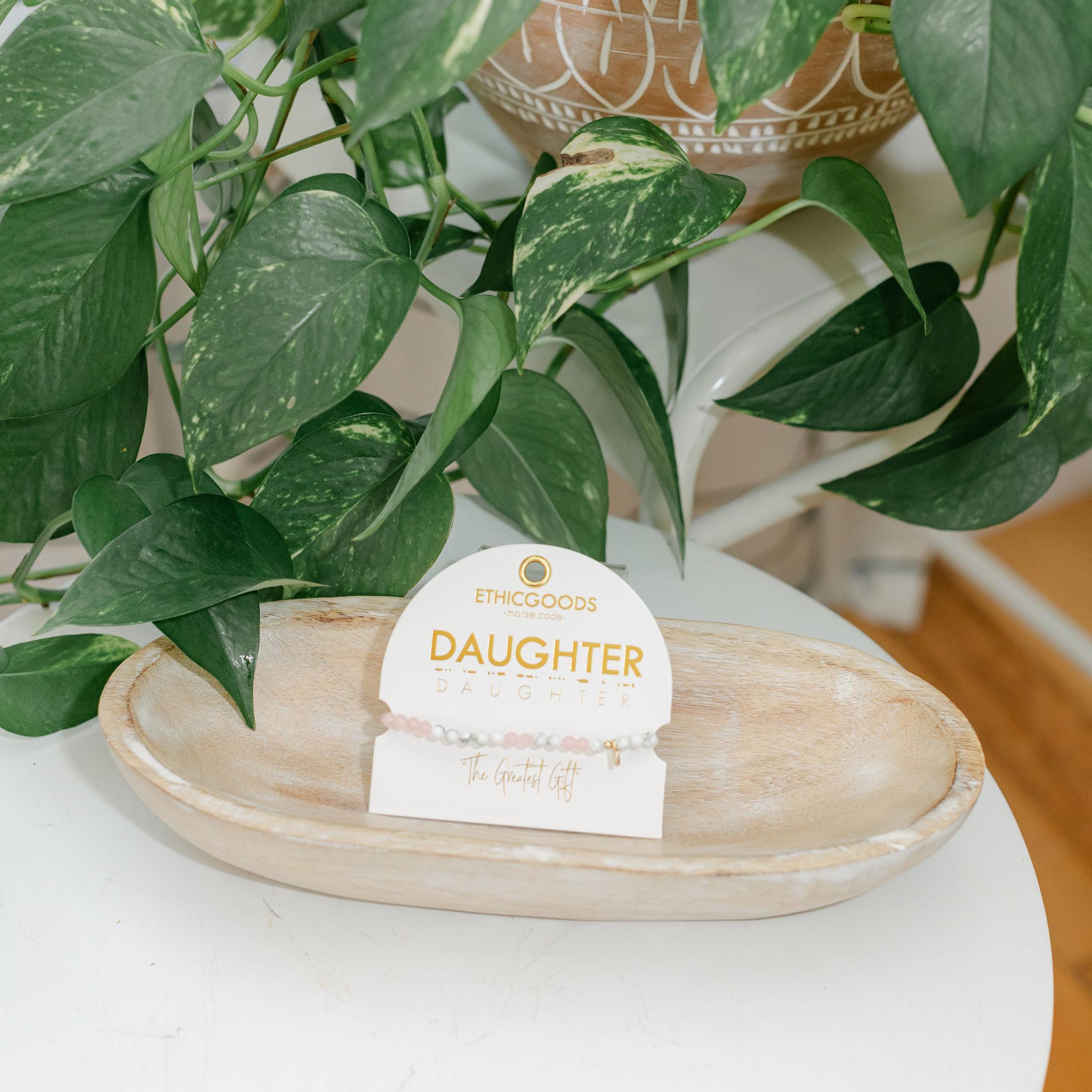 Potted plant with a &