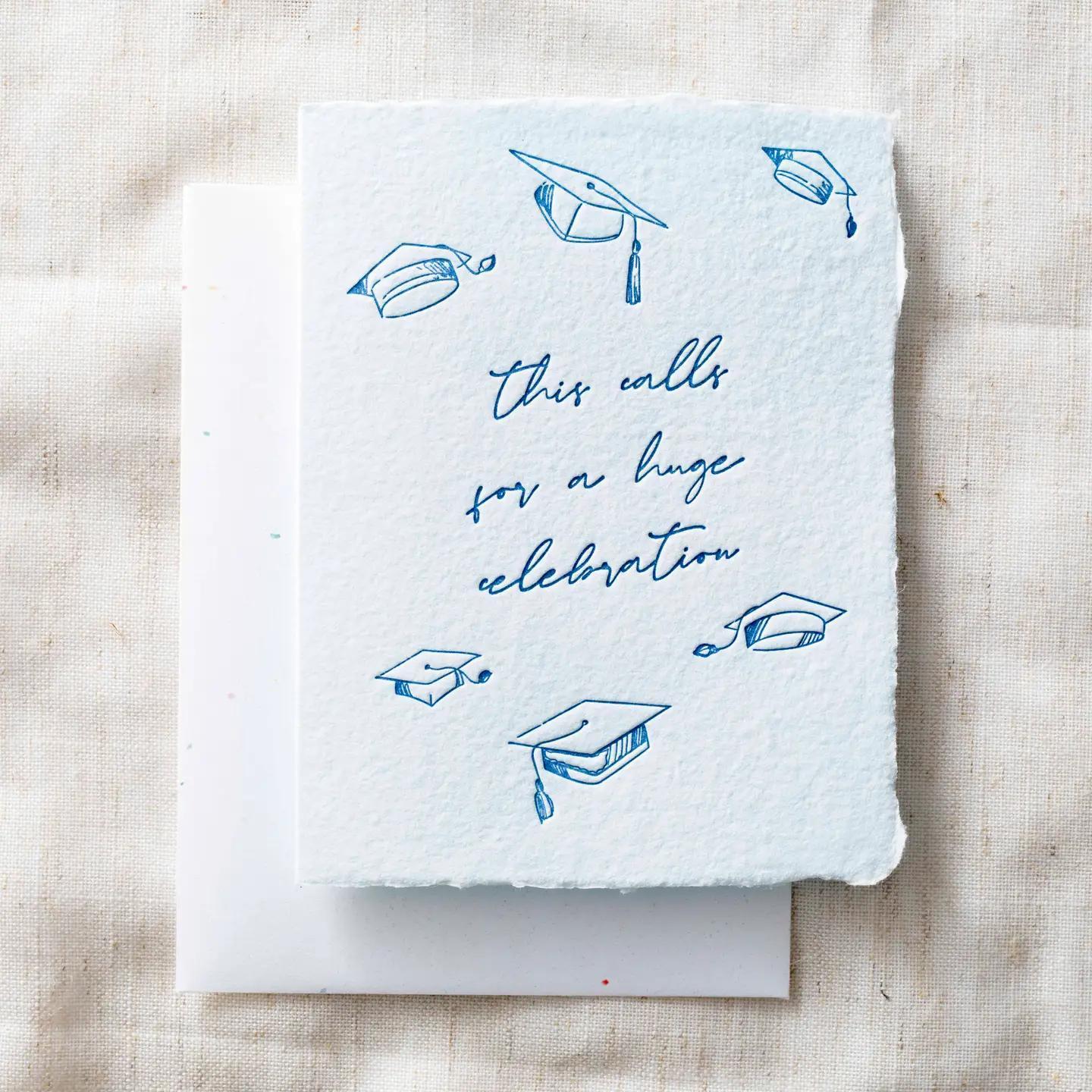 Graduation-themed card with blue text and illustrations on a textured beige background