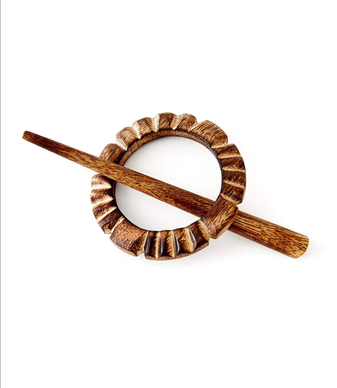 A wooden hair pin and hoop on a white background