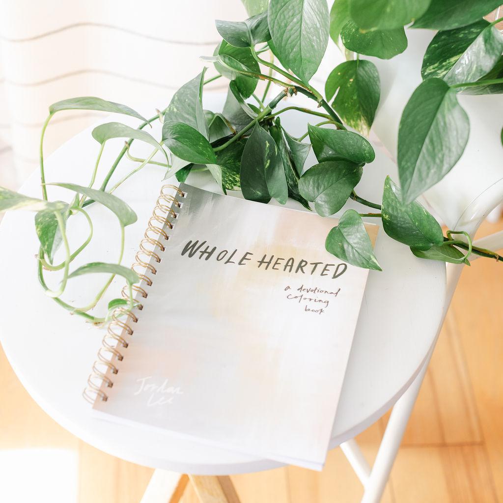 A spiral-bound coloring book devotional titled &