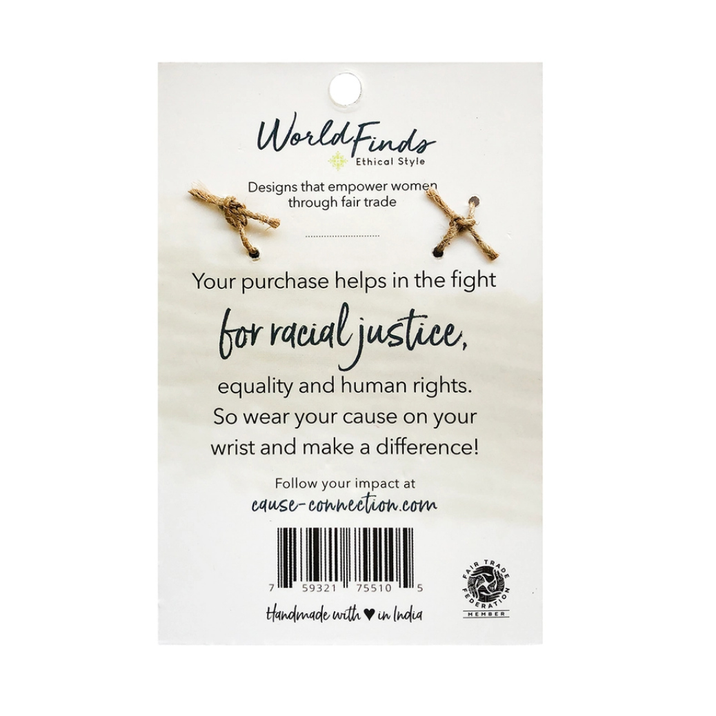 A World Finds product tag about racial justice