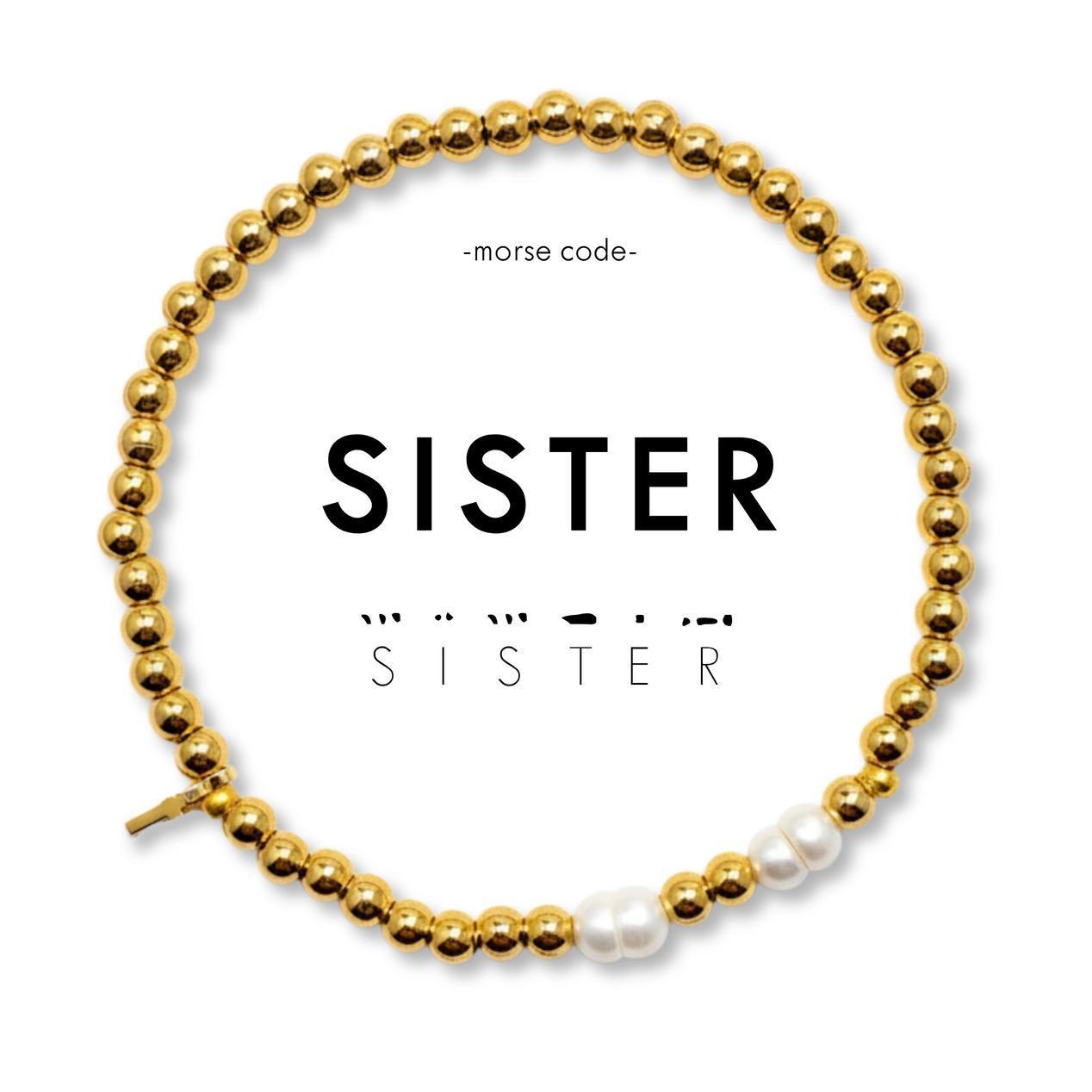Gold and pearl bracelet with &