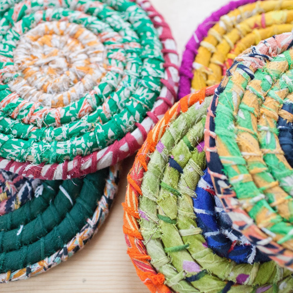 A stack of colorful trivets