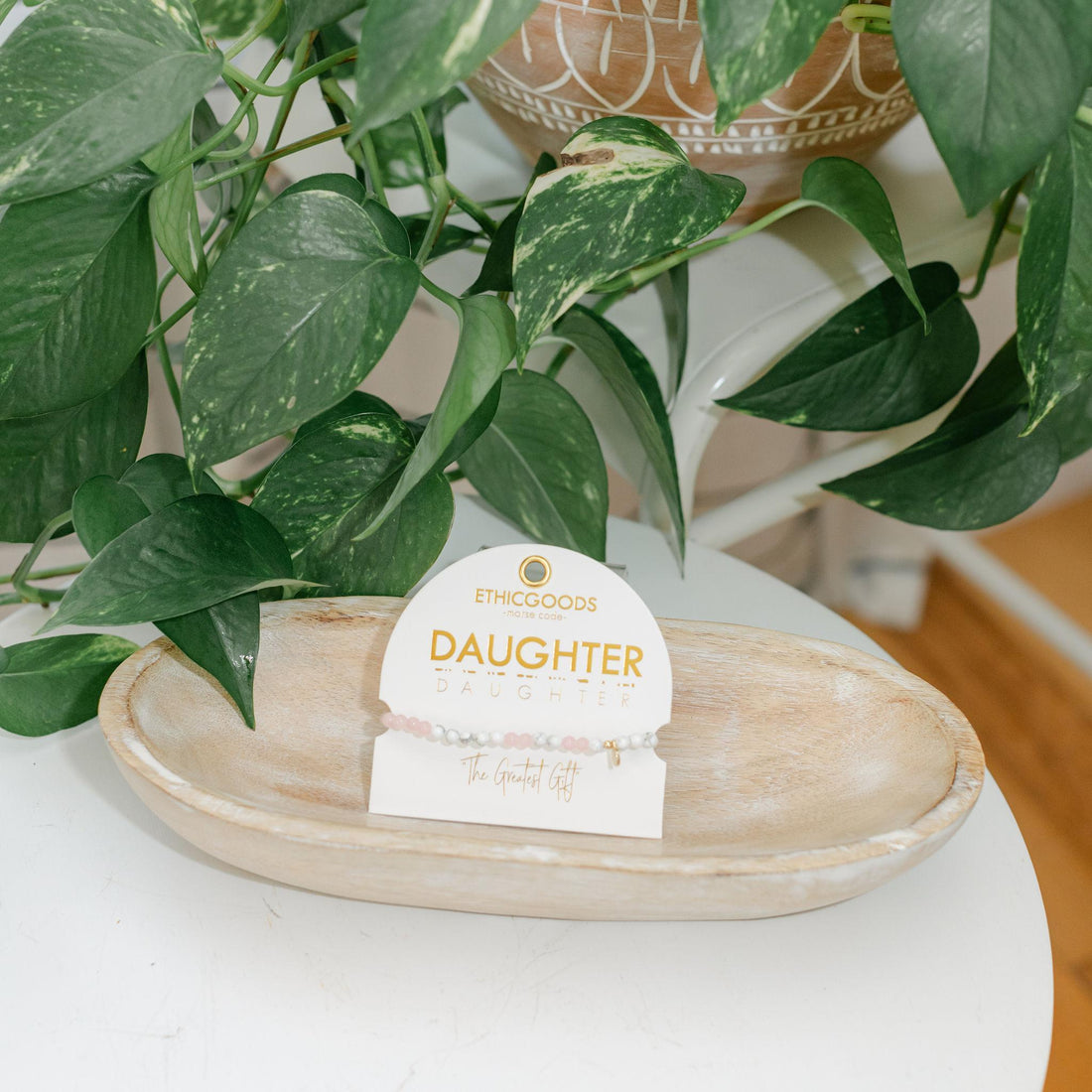Potted plant with a &