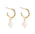 A pair of gold-plated hoop earrings with white oval freshwater pearls hanging from them.