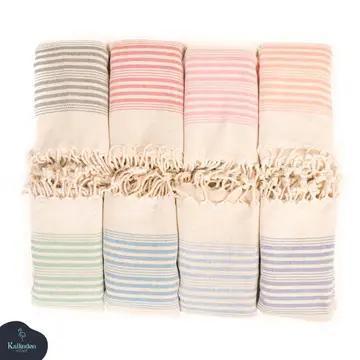 Set of striped towels with fringed edges on a white background