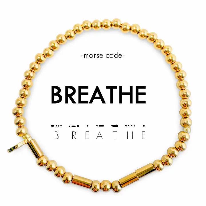 Gold beaded bracelet with &