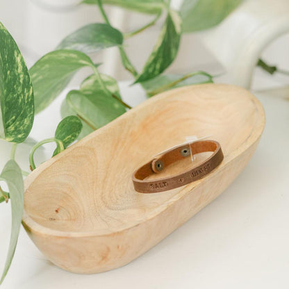 Brown leather bracelet with engraved text , &