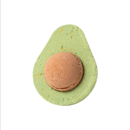 Avocado-shaped bath bomb with a brown center on a white background