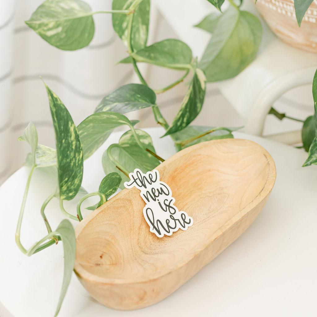 The New Is Here Sticker