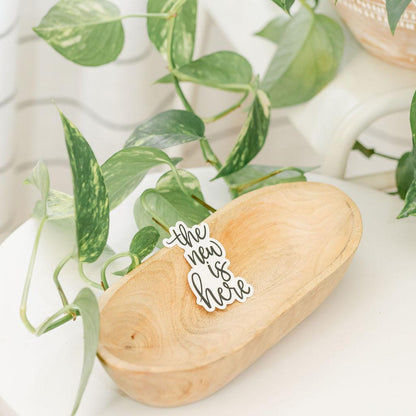 The New Is Here Sticker