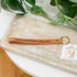Leather wristlet keychain with &
