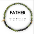 Bracelet with green and black beads on a white background with &