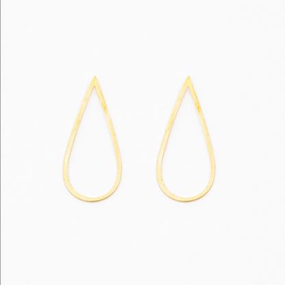 A pair of gold teardrop-shaped earring set on a white background